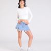 Talk About Me Mid-Rise Pleated Denim Skort